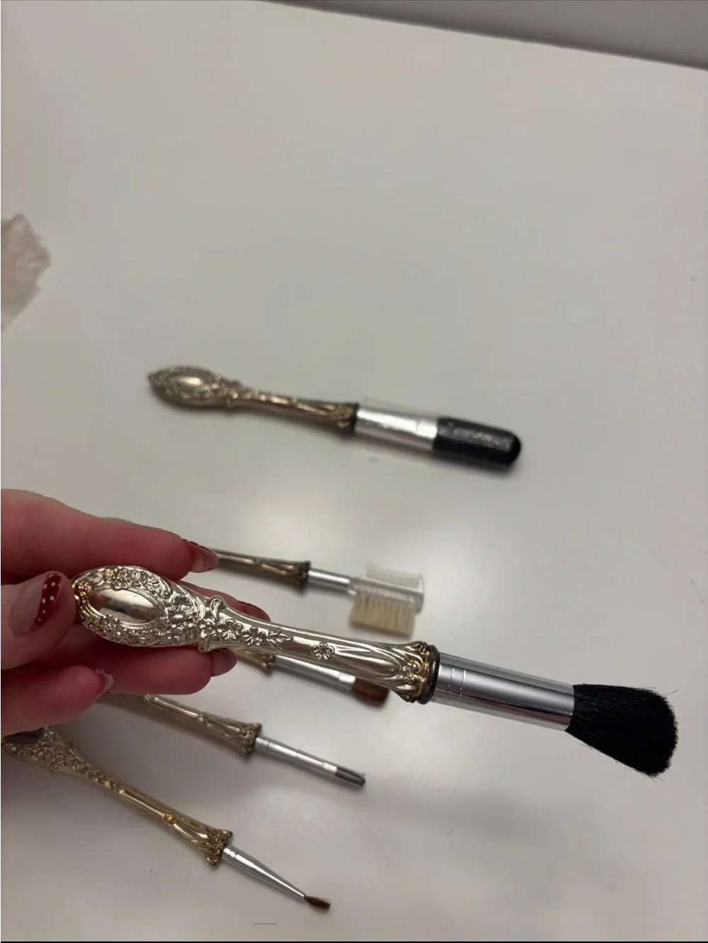 Vintage 6-piece silver-plated makeup brush vanity set with ornate scroll handle